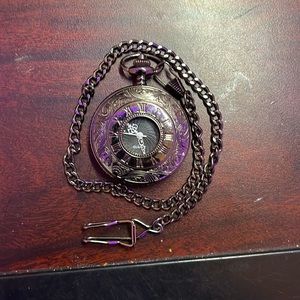 Selling a dark silver stopwatch with a polished finish. Prices are negotiable.